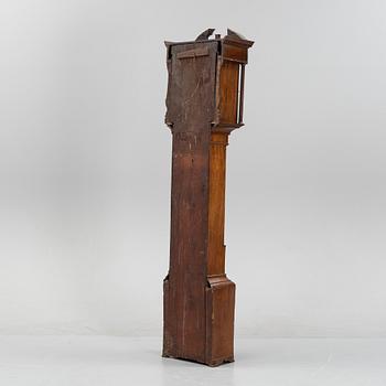 A mahognay long case clock from around the year 1800, H Bunyan Lincoln.