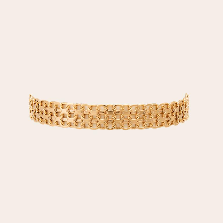 An 18K gold x-link bracelet.