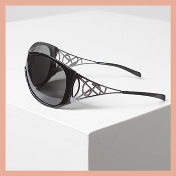 SOLGLASÖGON, Yves Saint Laurent.