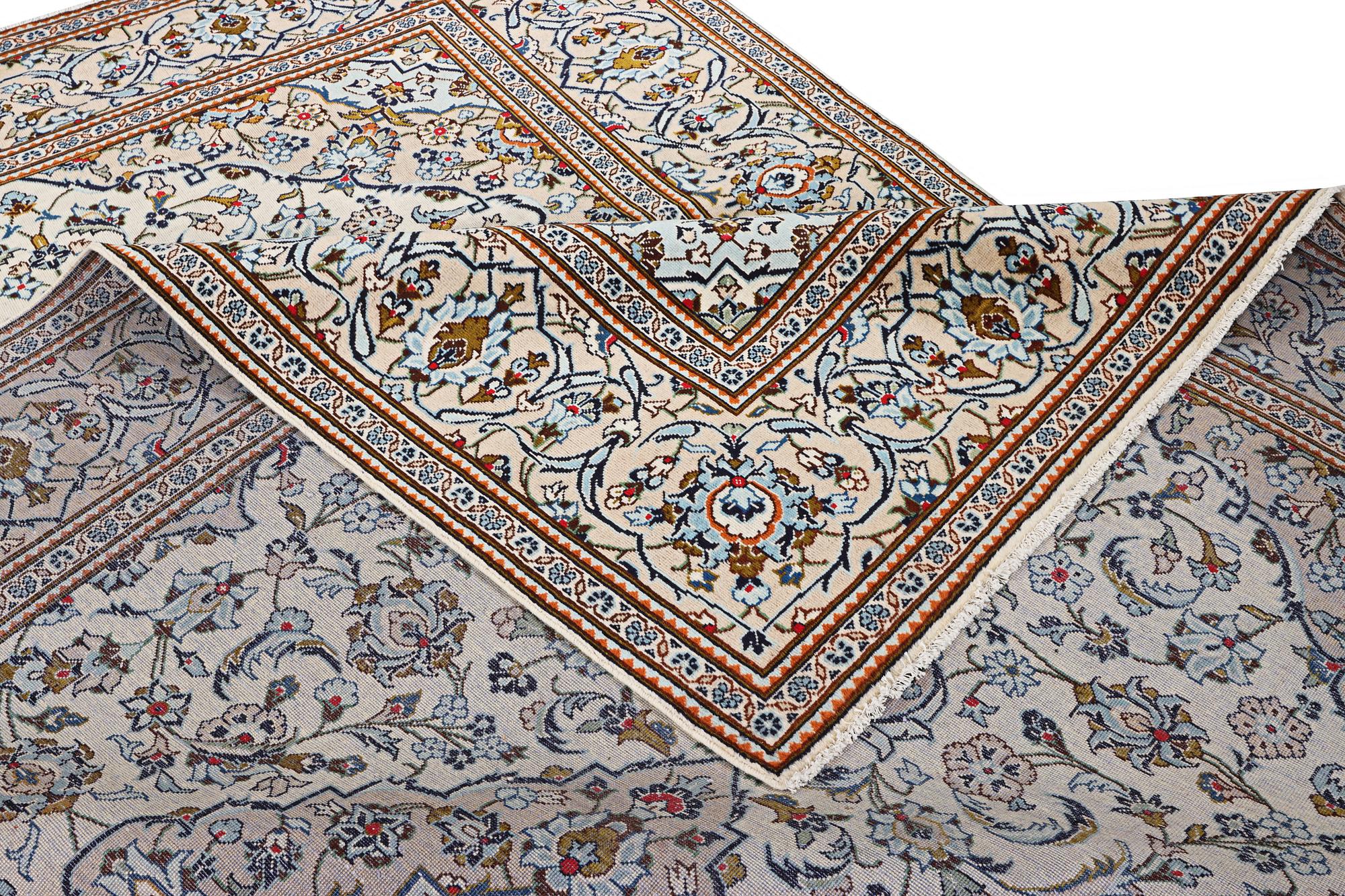 A Kashan carpet, c. 355 x 238 cm.