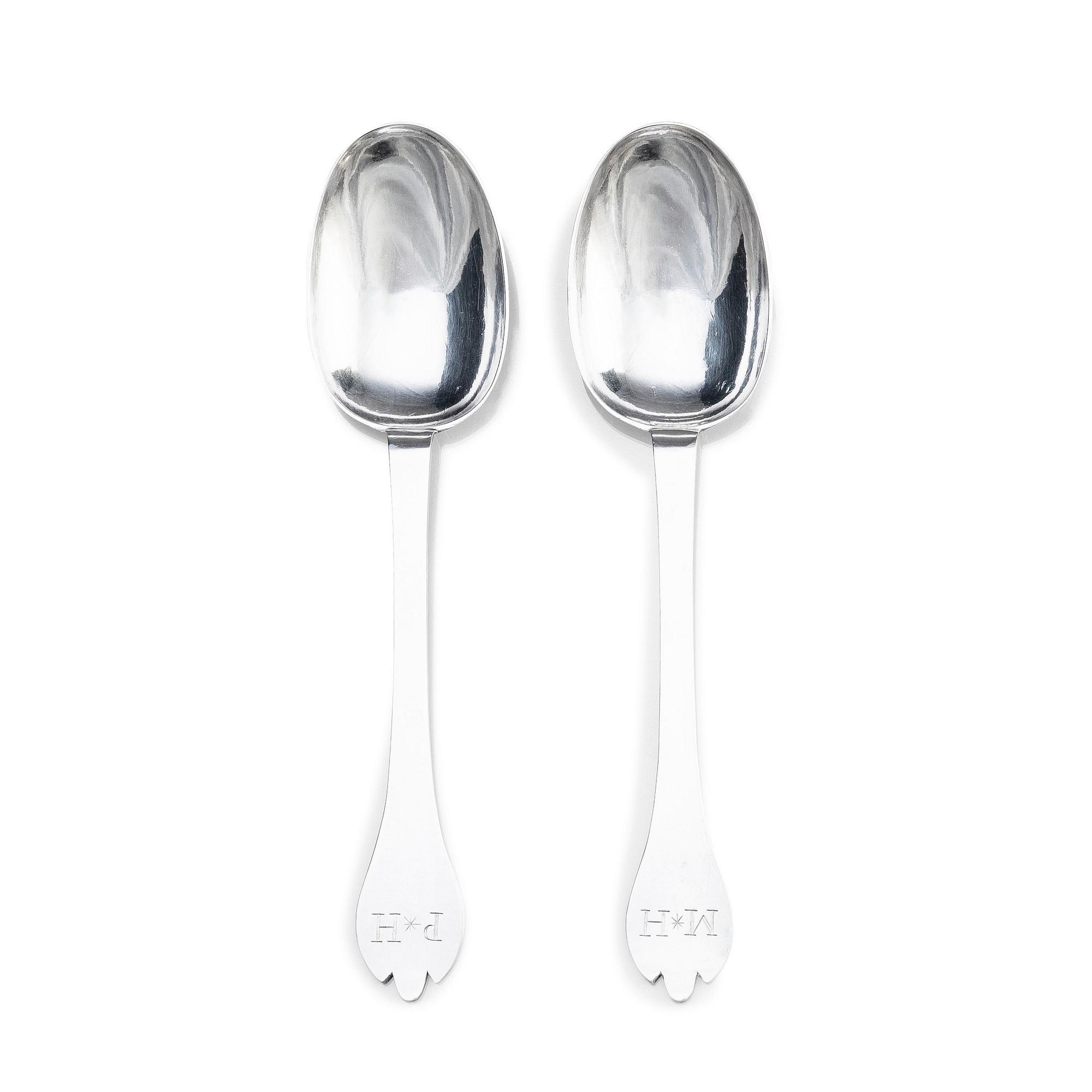 A pair of English trefid silver rat-tail spoons, London 1691. Possibly mark of James Lapley.