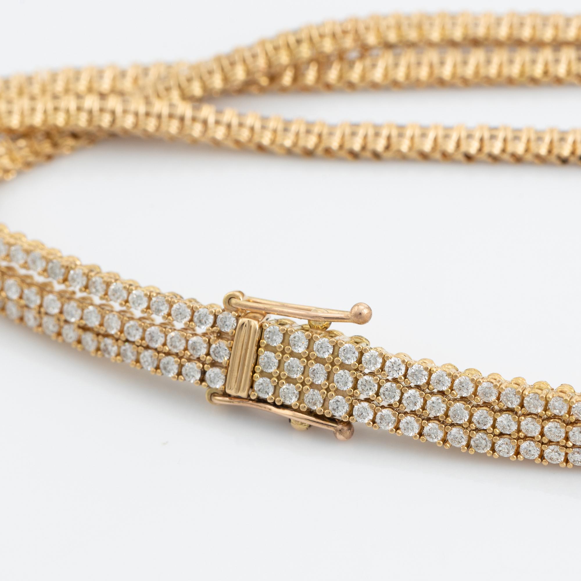 Brilliant cut diamond three strand bracelet.
