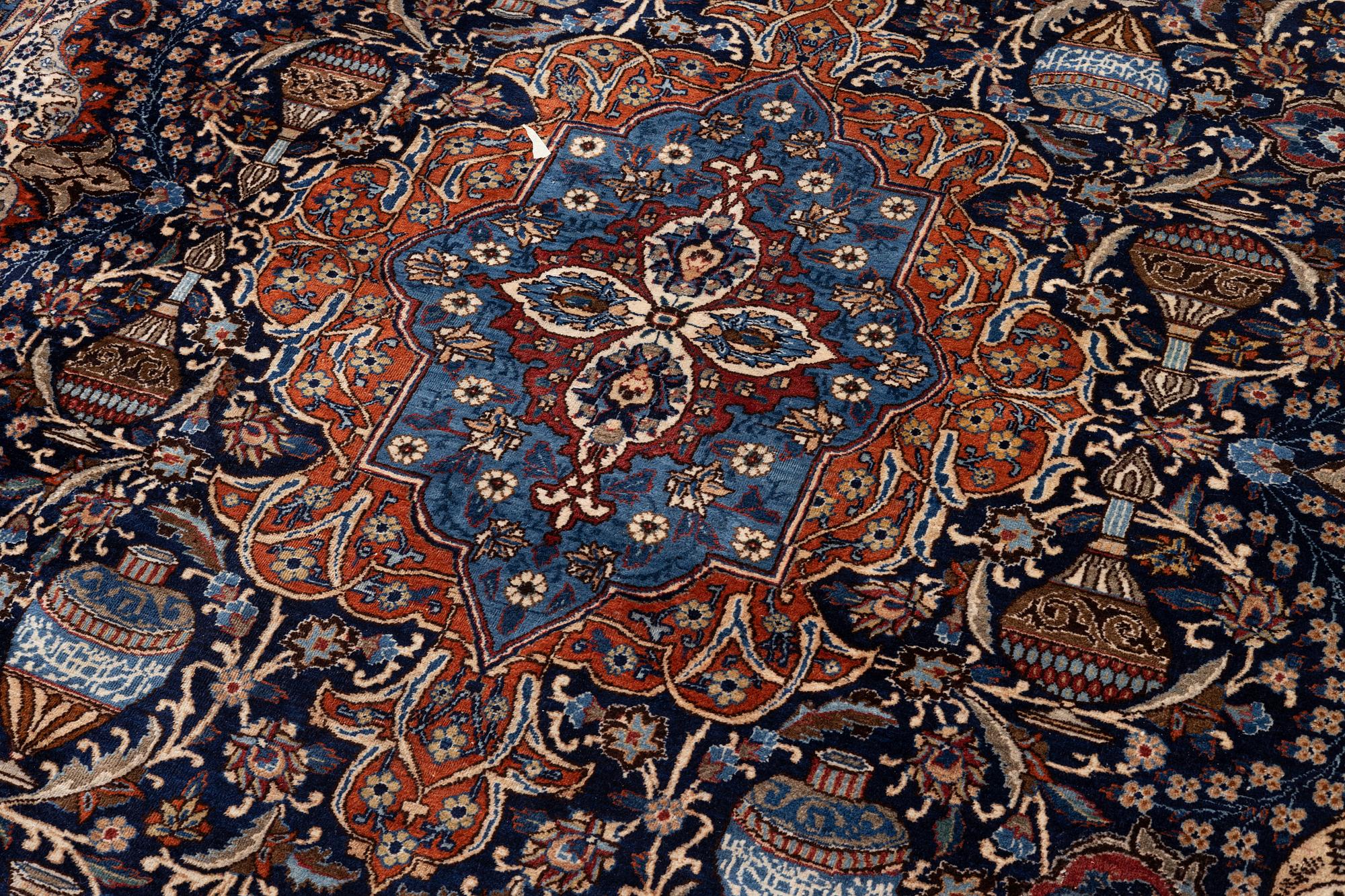 A Kashmar rug, c. 396 x 300 cm.
