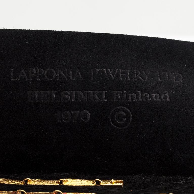 Björn Weckström, Kaulakoru "Kukkiva muuri", 18K kultaa ja turmaliineja. Lapponia 1974.