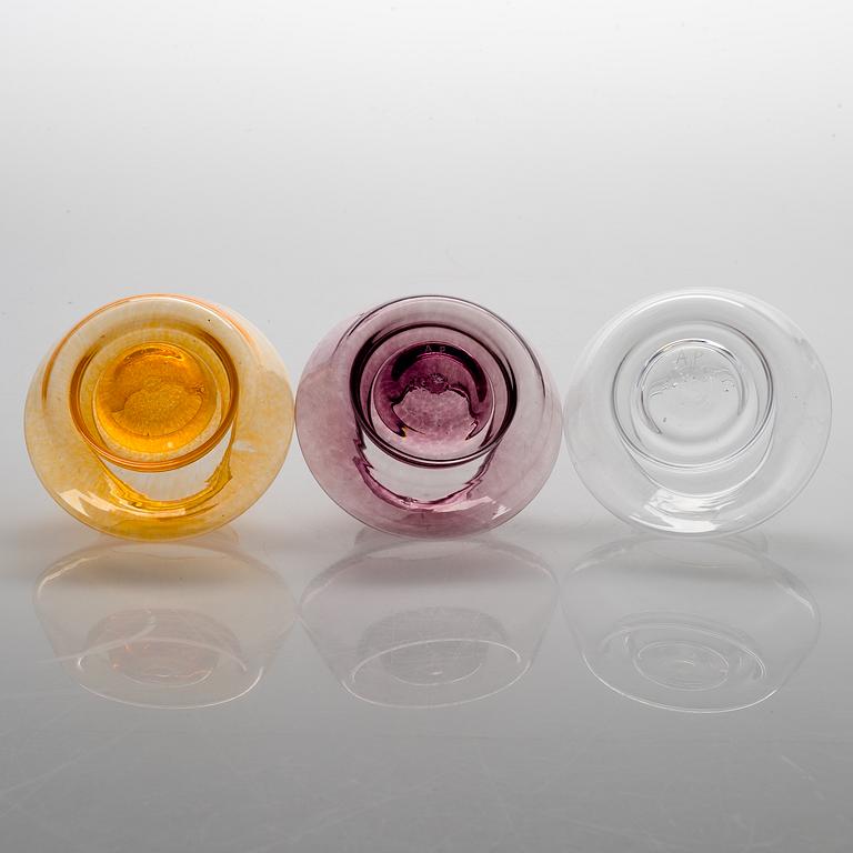ALEKSI PUUSTINEN, A three-piece glass candleholder, signed.