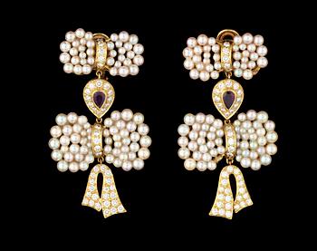 1072. A pair of cultured pearl, ruby and brilliant cut diamond earrings.