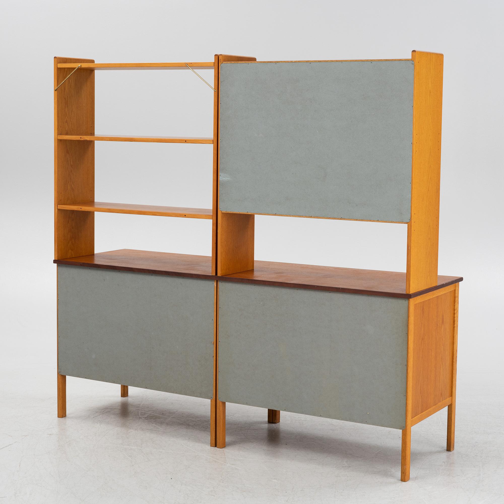 A teak veneered mid Century bookcase.
