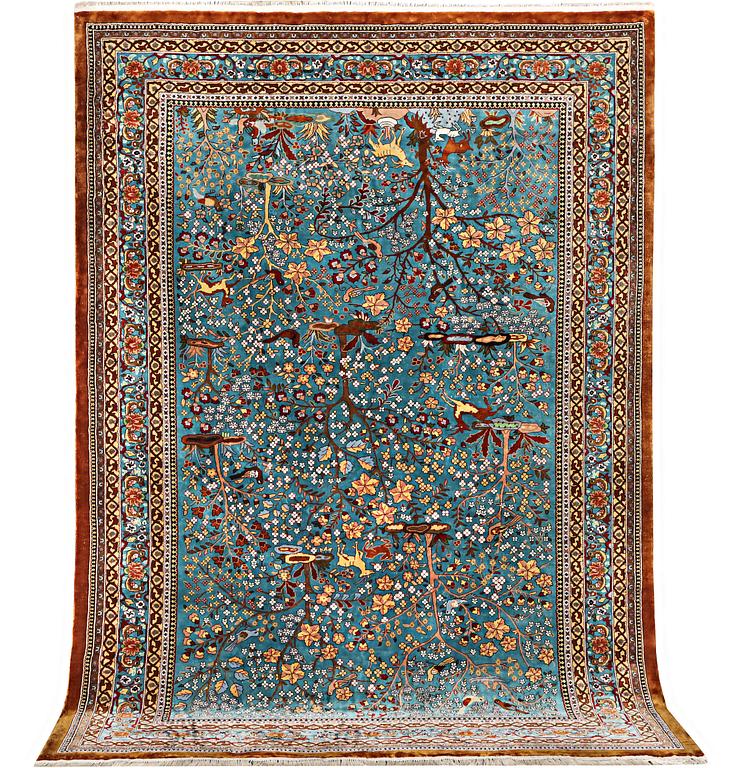 An all silk oriental carpet, a. 280 x 185 cm.