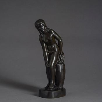 JUST ANDERSEN, a signed metal sculpture.