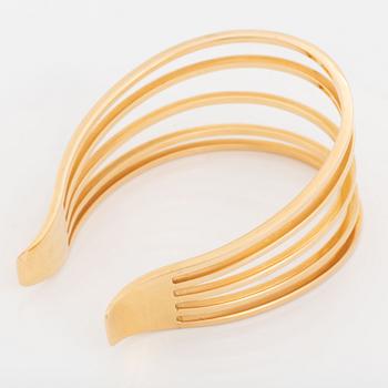 An 18K gold Sigurd Persson bracelet.