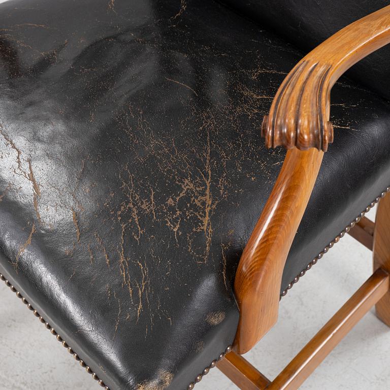 A leather upholstered armchair, 20th Century.