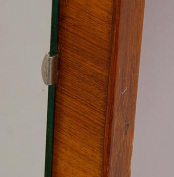 A teak mirror, mid 20th century.