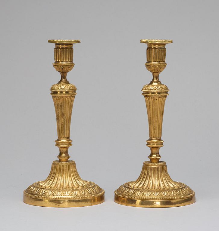 A pair of candlesticks, Louis XVI-style, circa 1900.