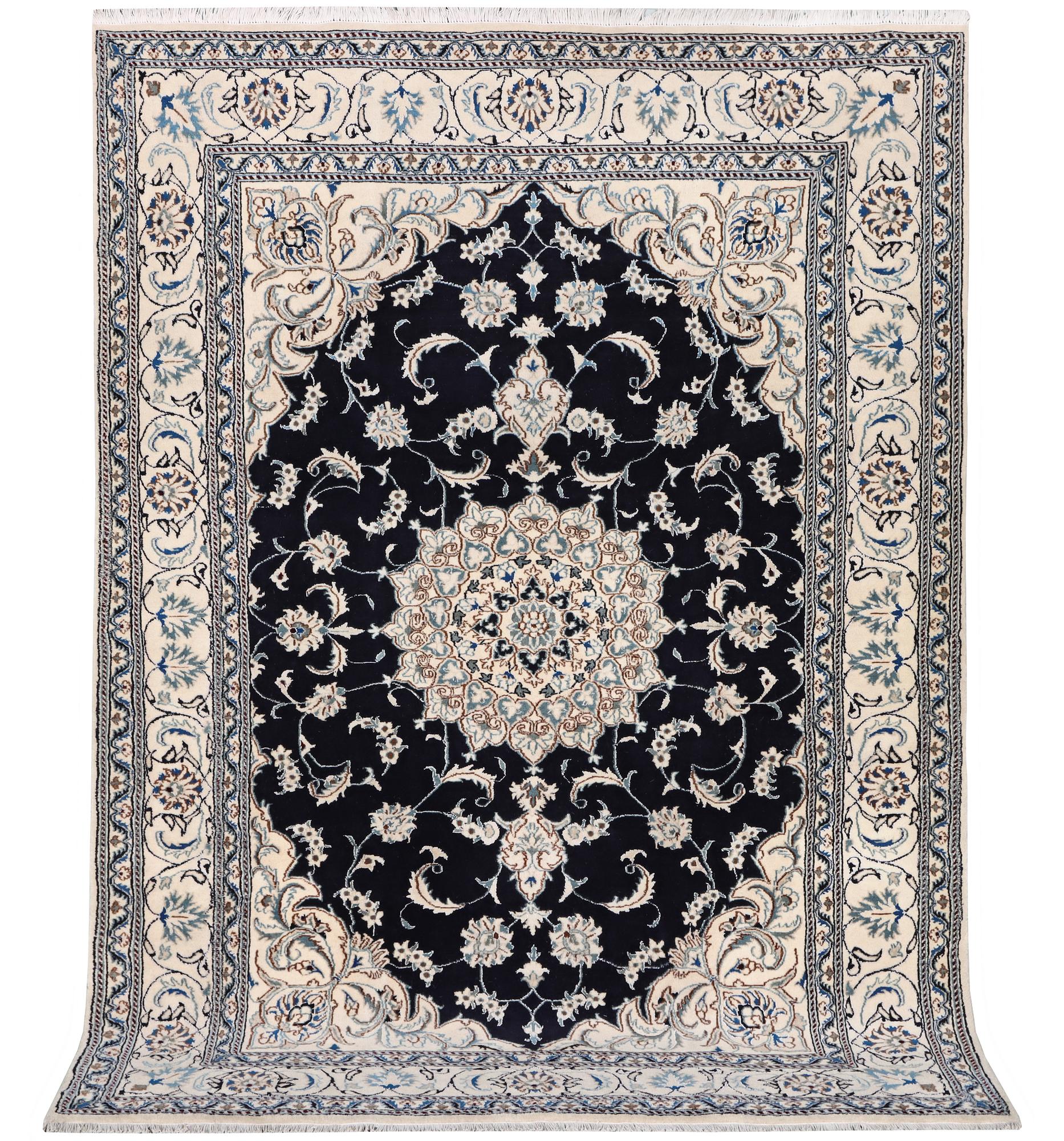 A Nain carpet, part silk, c. 303 x 200 cm.