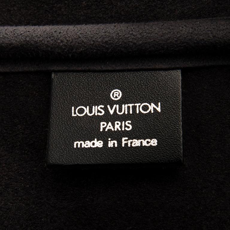 Louis Vuitton, a 'Taiga Kendall PM' weekend bag.