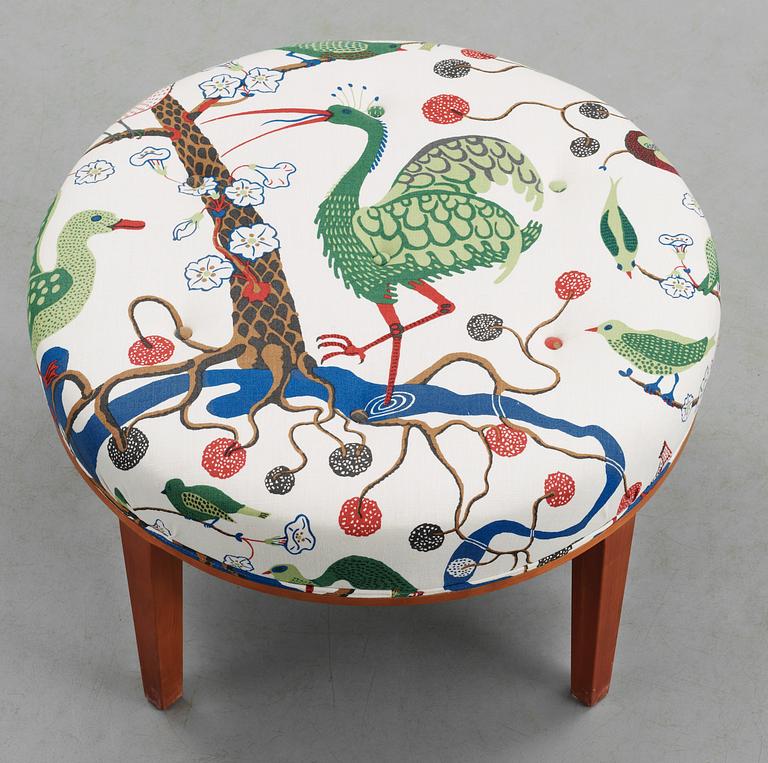 A Josef Frank cherrywood stool by Svenskt Tenn, model 647.
