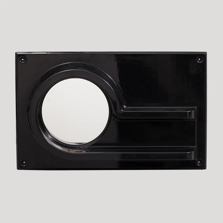 A 1970s plastic mirror by IKEA.