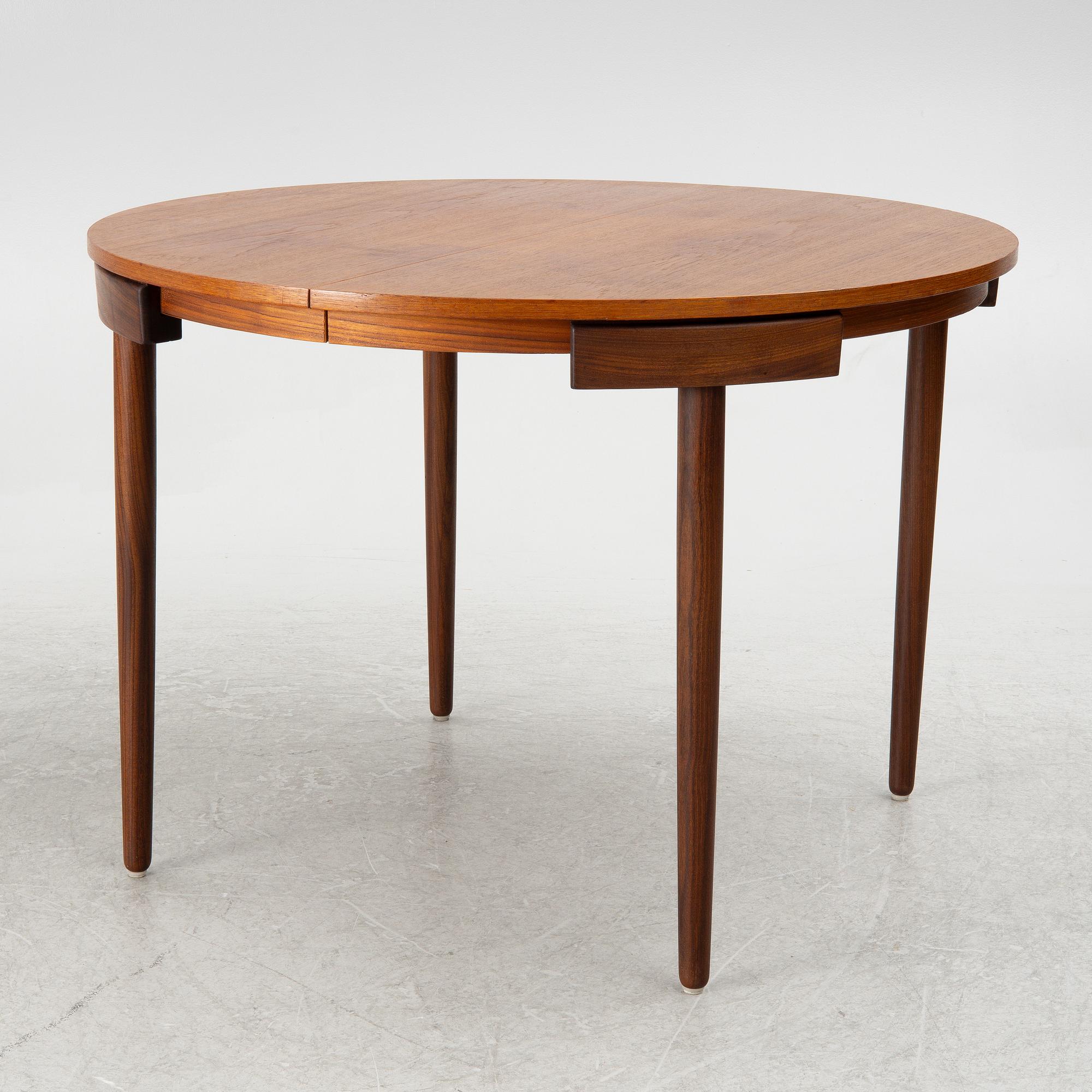 Hans Olsen, a dining table and four chairs, Frem Røjle, Denmark, 1950's.