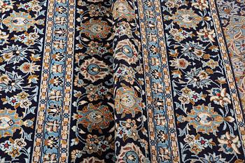 A carpet, Kashan, ca 391 x 286 cm.