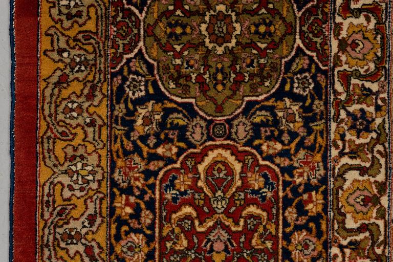 A carpet, semi-antique Tabriz, ca 398 x 290 cm.