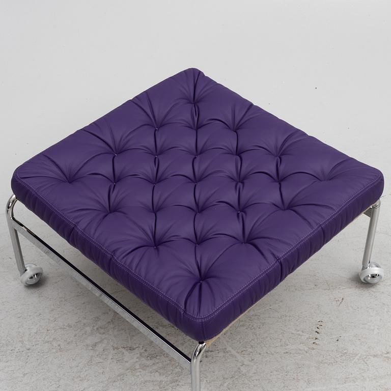 Bruno Mathsson, a limited edition of 'Karin 73' leather upholstered easy chair with footstool, from Dux, Released 2022.