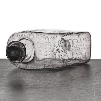 A glass bottle, 18th Century.