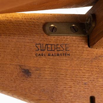 Carl Malmström & Yngve Ekström, a pair of 'Caryngo' oak armchairs, Swedese, second half of the 20th century.