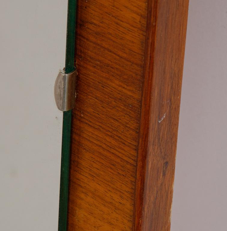 A teak mirror, mid 20th century.
