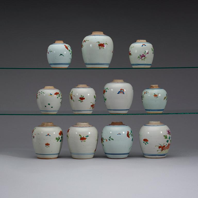 A set of 11 famille rose pots, Qing dynasty, Qianlong (1736-95).
