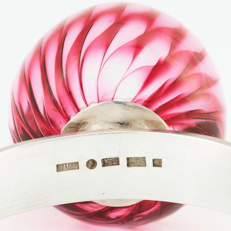 Sigurd Persson, a sterling silver bangle crowned with a strawberry coloured glass ball, Stockholm 1995.