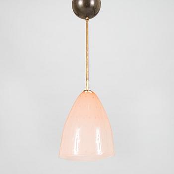 Gunnel Nyman, kattovalaisin, malli 50597, Idman 1900-luvun puoliväli.