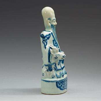 A blue and white figure of Shoulao, Ming dynasty (1368-1644).