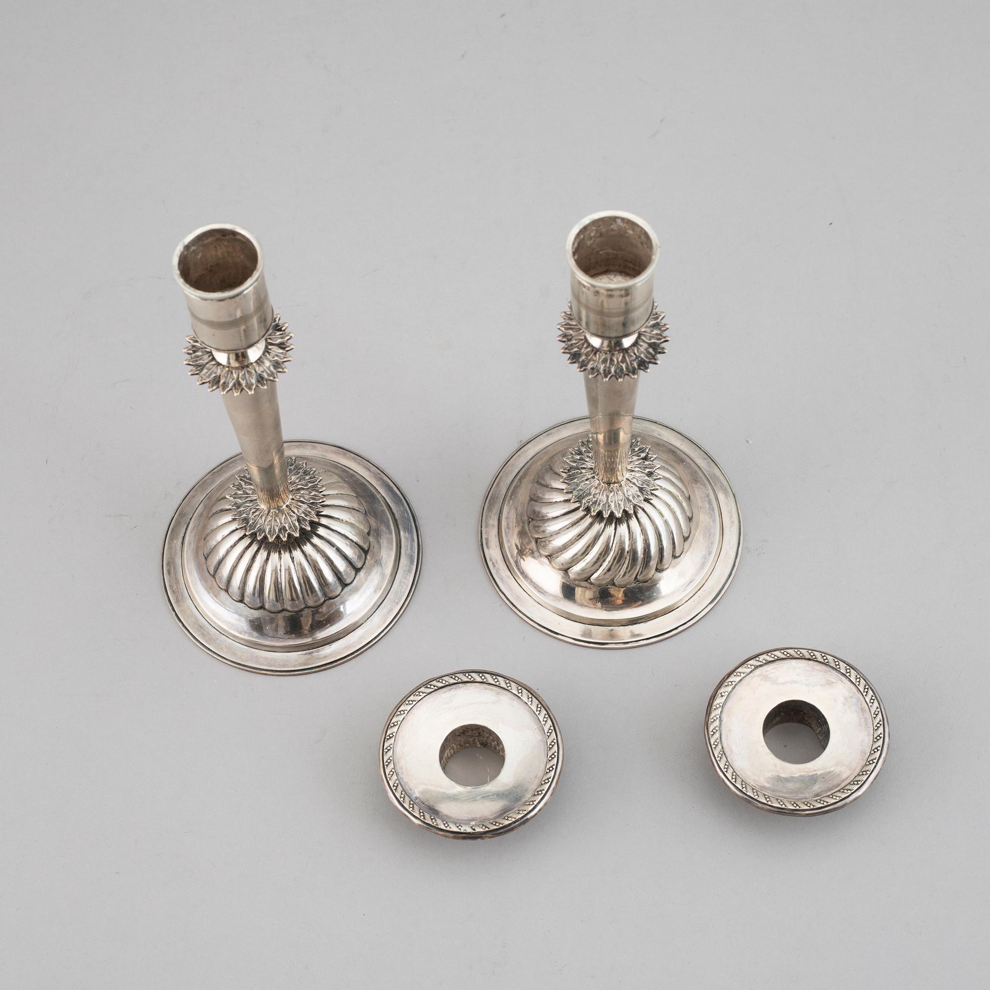 A pair of Empire silver candle sticks, 1823.