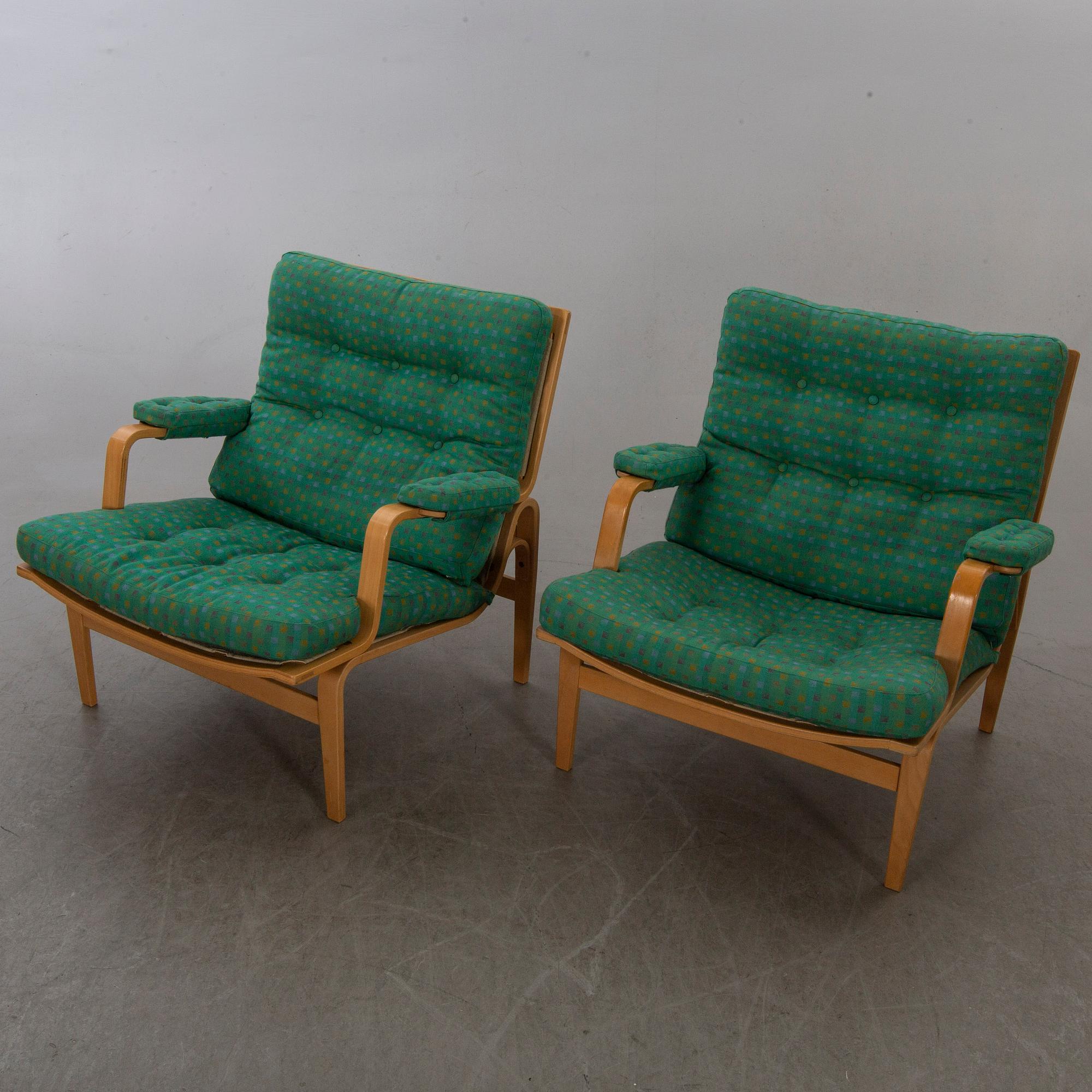 BRUNO MATHSSON, a pair  of easy chairs "Ingrid" for DUX.