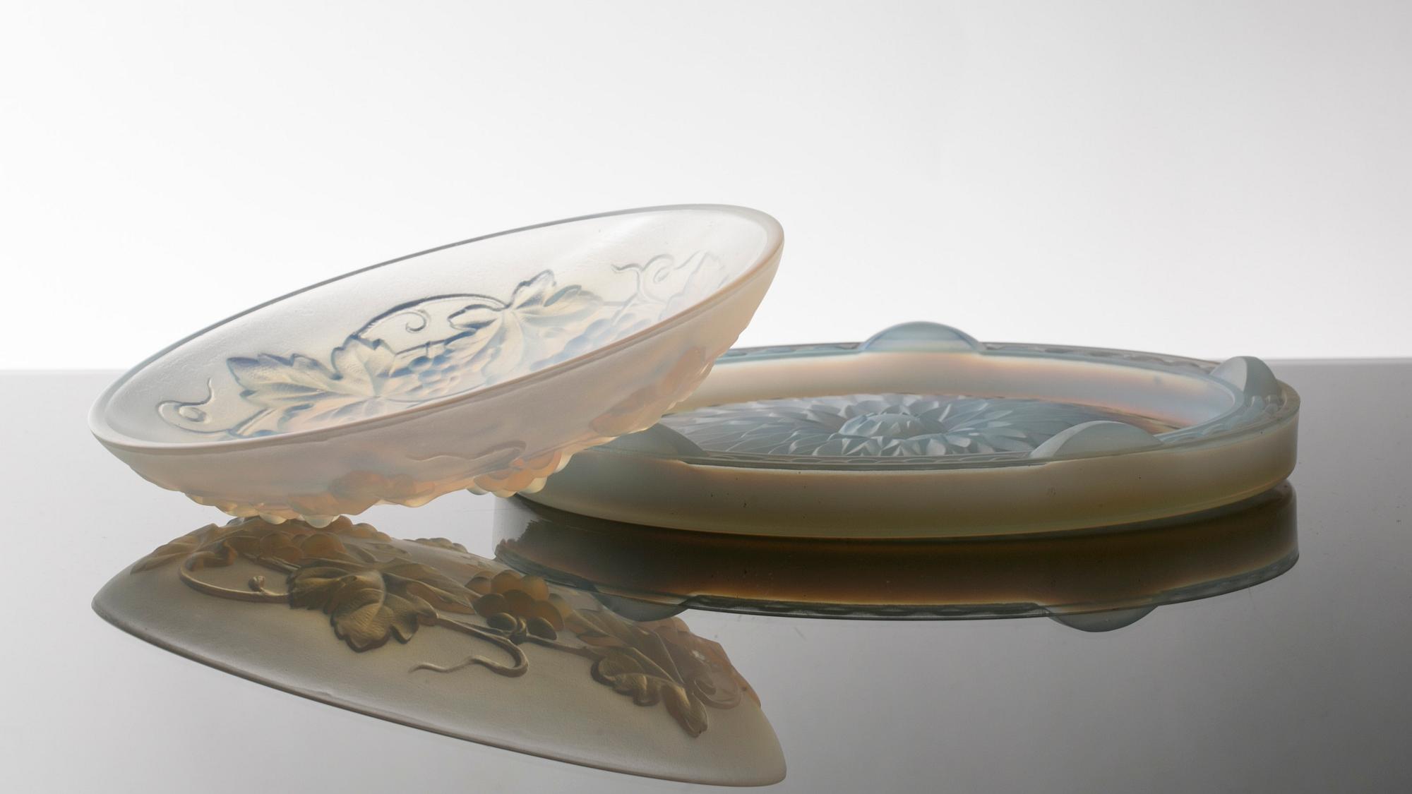 TWO FRENCH GLASS DISHES BY CESARO AND SABINO.