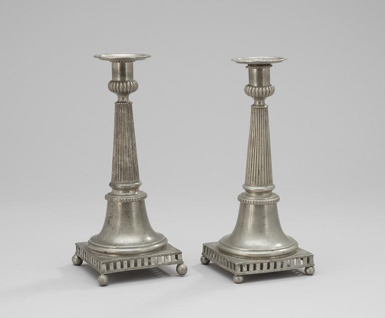 A set of two 18th century pewter candlesticks, makers mark Hans Wiksten, Västerås 1782-1810/14..