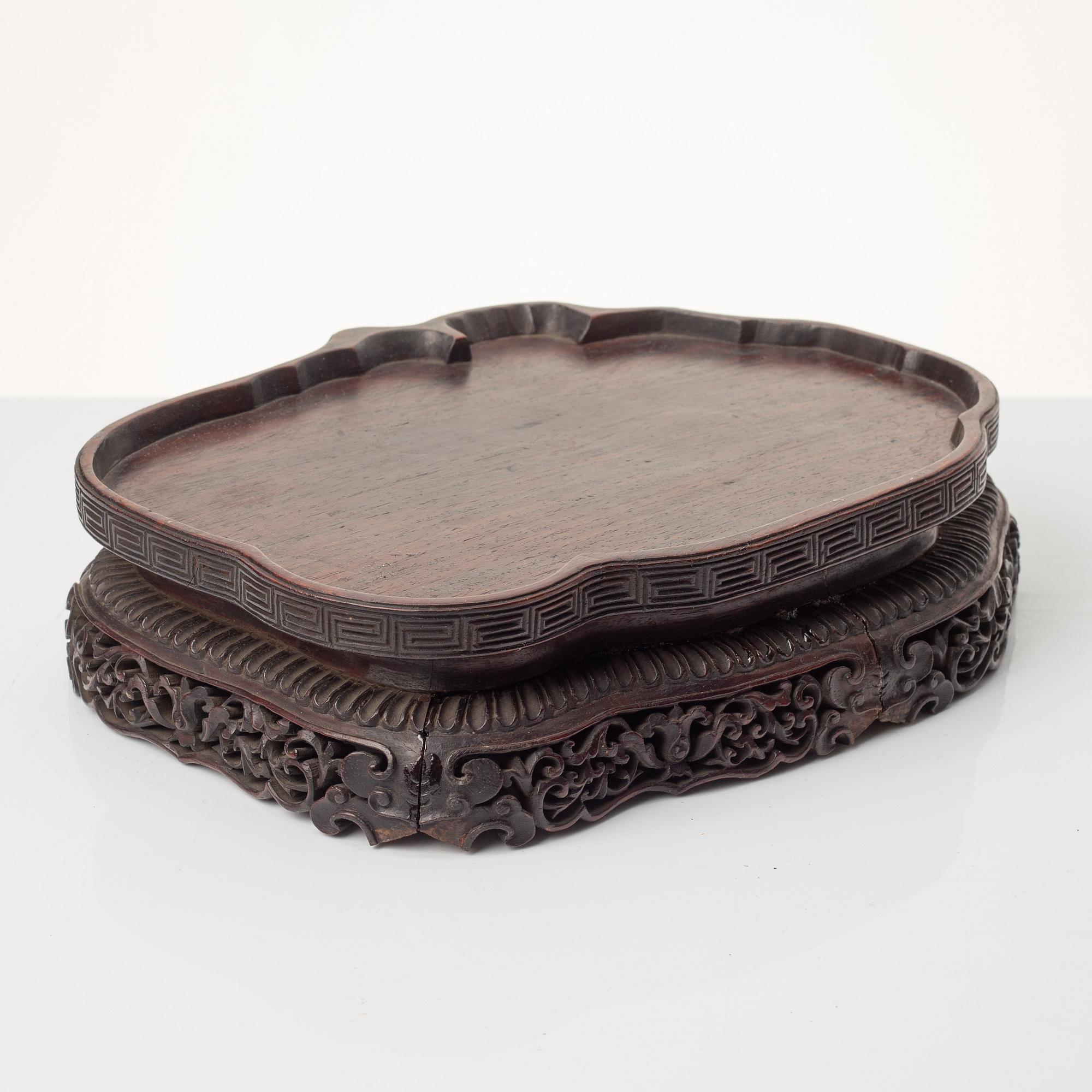 A group of Chinese hardwood stands and a cover, Qing dynasty and later.