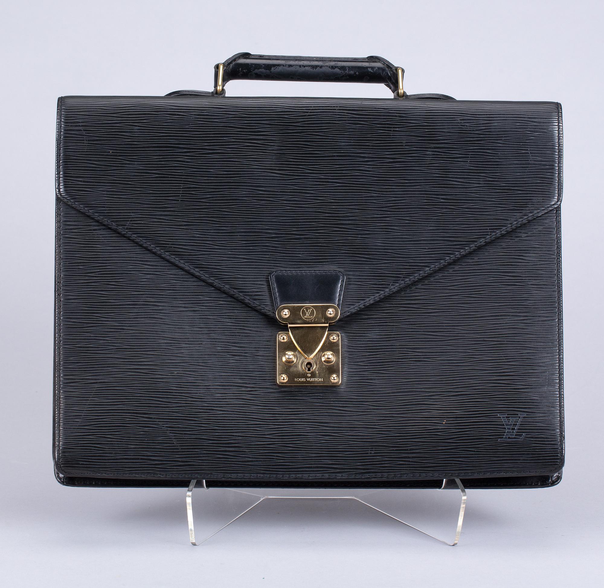 PORTFÖLJ, "Serviette conseiller ambassadeure Epi", Louis Vuitton.