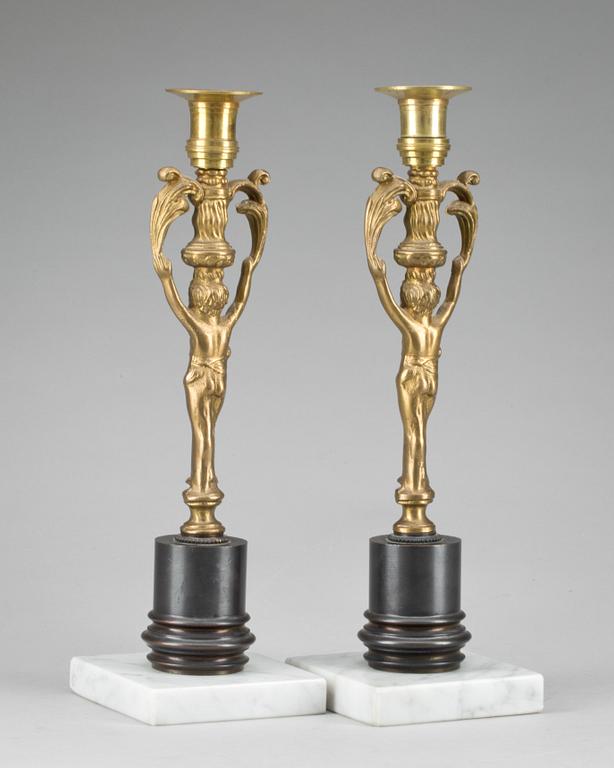 LJUSSTAKAR, ett par, empirestil, omkring 1900.