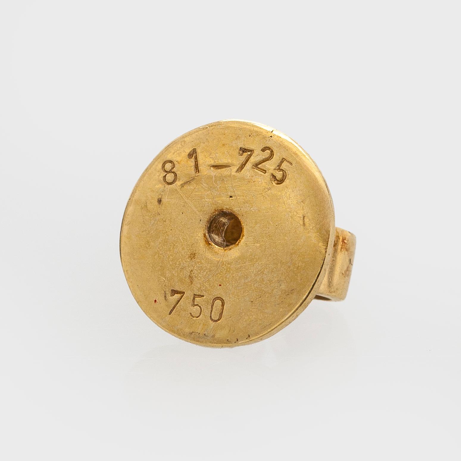 Korvakorut, 18K kultaa, rubiineja ja timantteja.