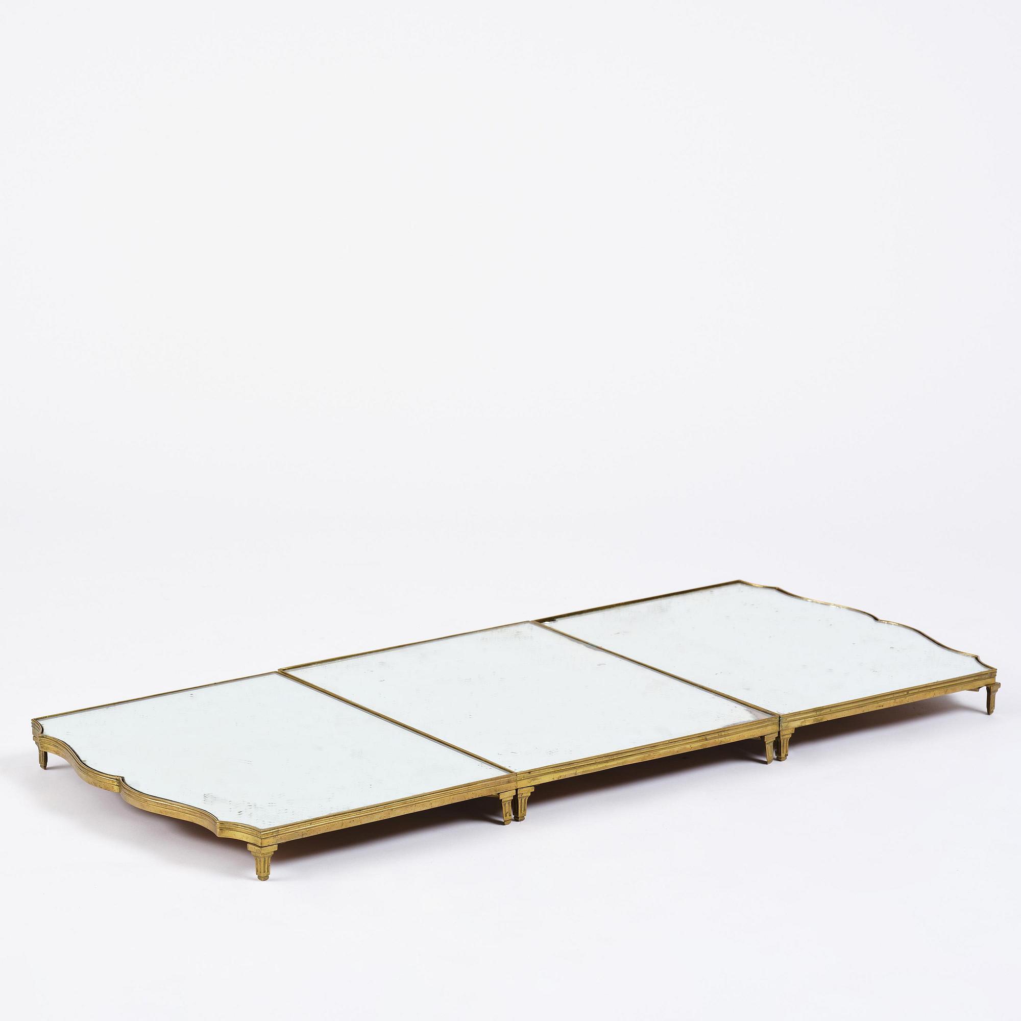 A Gustavian three-piece brass and glass surtout de table, Stockholm, later part 18th century.