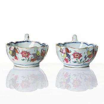 A pair of famille rose pseudo tobacco leaf sauce boats, Qing dynasty, Qianlong (1736-95).