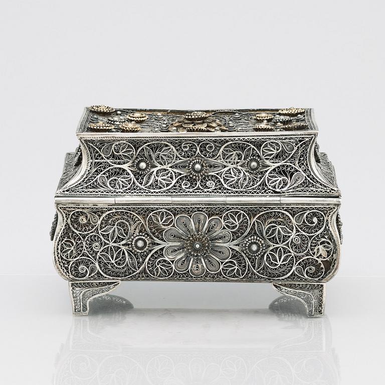 A 19th Century silver filigree box, unidentified makers mark R.K, Assay master mark of Ivan Lebedkin, Moscow 1898-1908.