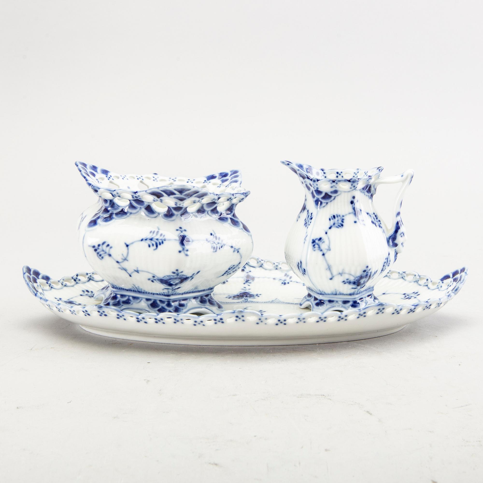 A Royal Copenhagen Musselmalet 74 pcs porcelain service alter part of the 20th century.