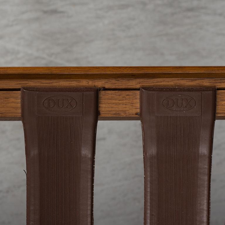 A pair of 'USA 75' teak easy chairs by Folke Ohlsson for Dux.