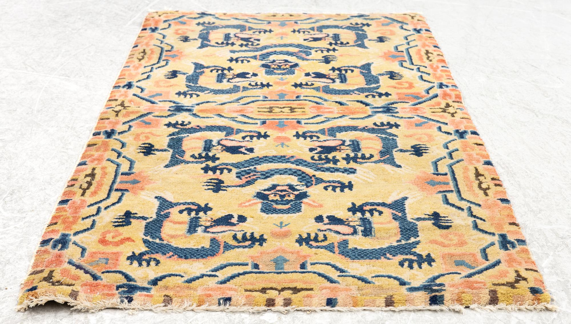 A Chinese antique Ningxia rug, late Qing dynasty, c. 128 x 67 cm.