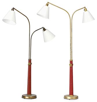 884. A pair of Hans Bergström brass and red leather floorlamps, Ateljé Lyktan, Sweden, 1940's.