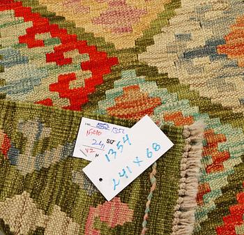 A runner carpet, kilim, c. 241 x 68 cm.