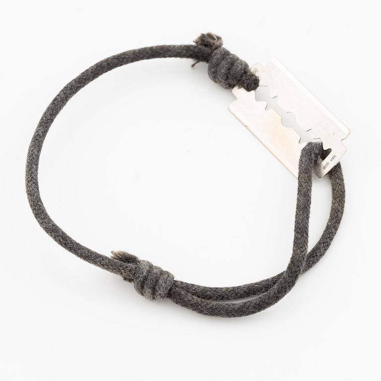 Bracelet, Dinh Van, textile and 18K white gold.
