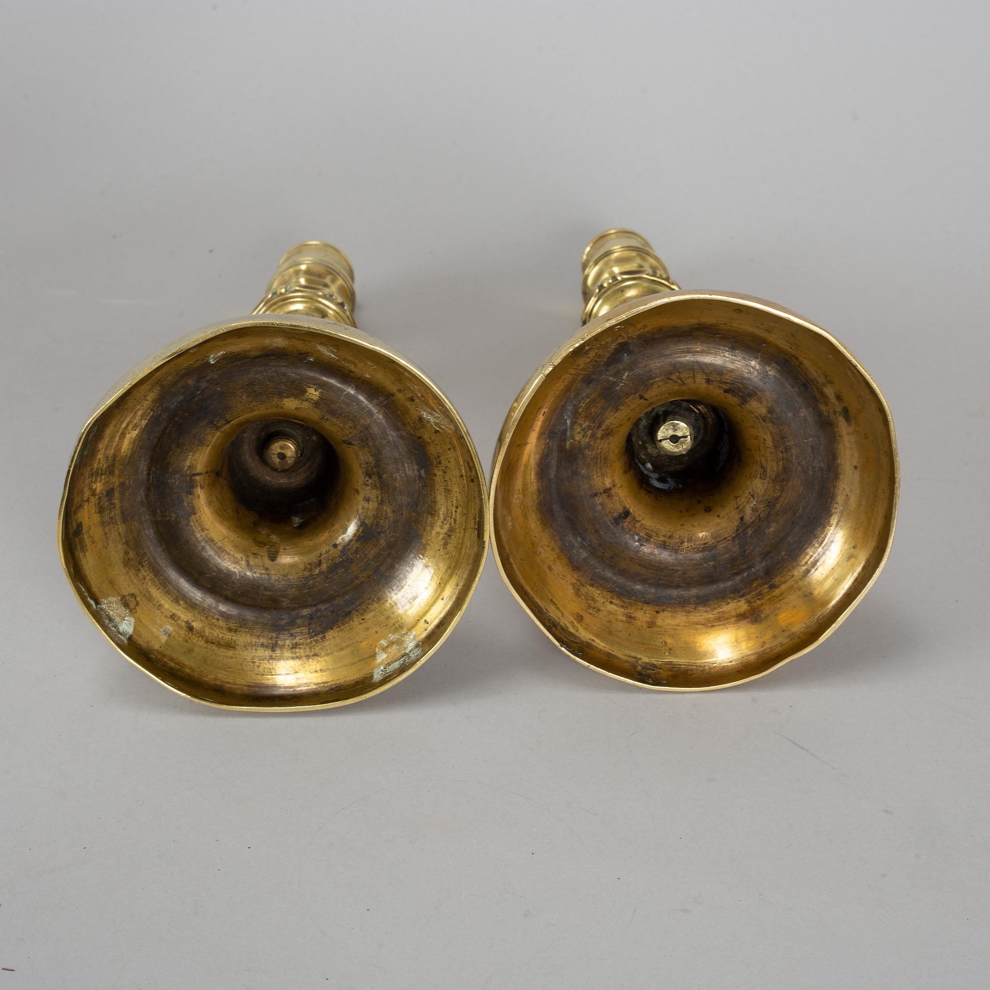 A pair of Louis Seize bronze candlesticks, late 18th century.